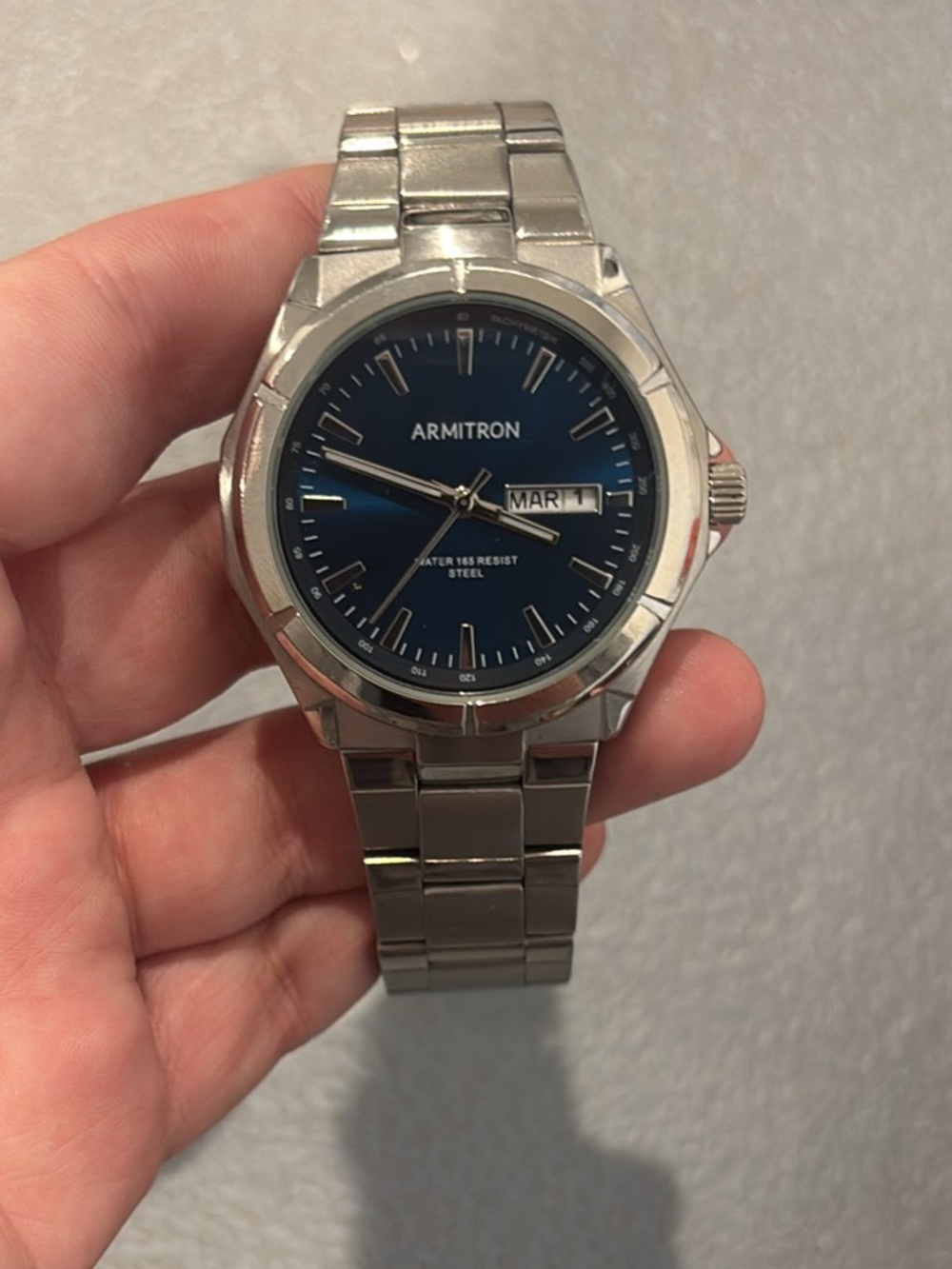 Armitron Silver Watch with Blue Dial and Day-Date Window